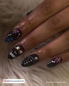 Black Almond Nails With White, Blue And Pink Flowers