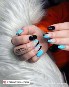 Black And Blue Nail Art In French Tip Design