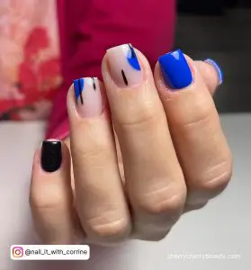 Black And Blue Nails With Abstract Design