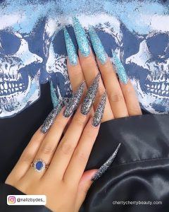 Black And Blue Stiletto Nails With Glitter