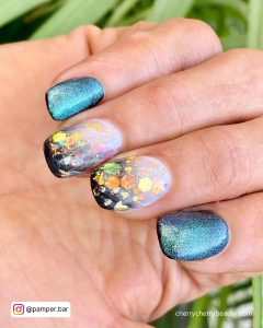 Black And Glitter Nail Designs With Galaxy Effect