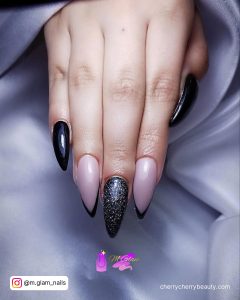 Black And Glitter Nails With Nude Base Coat
