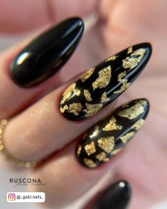 Black And Gold Long Nails In Almond Shape