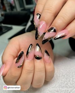 Black And Gold Nails Almond In French Tip Design