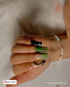 Black And Green Acrylic Nails