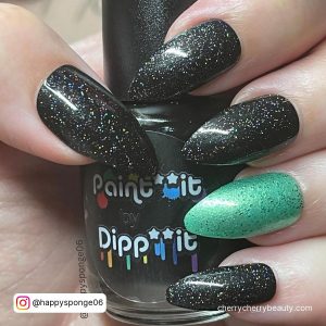 Black And Green Glitter Nails In Stiletto Shape