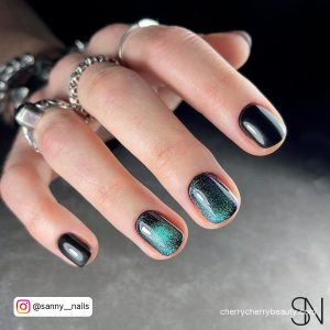 Black And Green Nails With Glitter