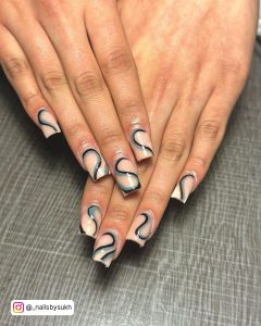 Black And Green Swirl Nails In Coffin Shape