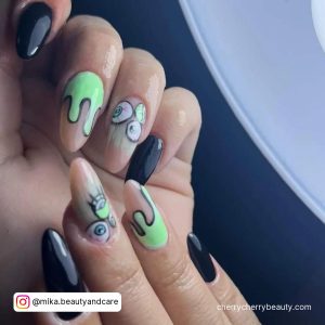 Black And Lime Green Ombre Nails With Different Design On Each Finger