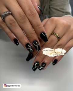 Black And Marble Acrylic Nails In Coffin Shape