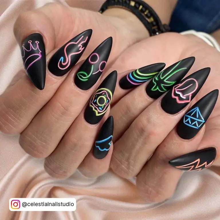 Black And Neon Green Nails In Stiletto Shape