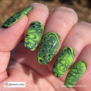 Black And Neon Green Nails With Flower Pattern