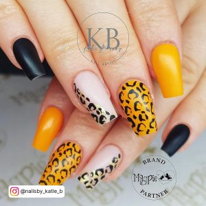Black And Neon Yellow Nails With Cheetah Print