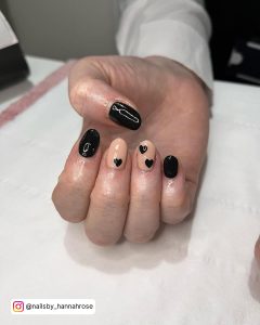 Black And Nude Almond Nails With Hearts
