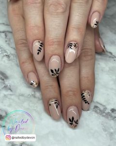Black And Nude Nail Art With Stems And Leaves