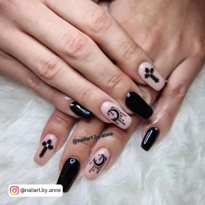 Black And Nude Nail Ideas With Cross Sign