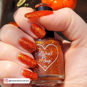 Black And Orange Nails For Halloween With Glitter