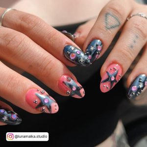Black And Pink Chrome Nails With Embellishments