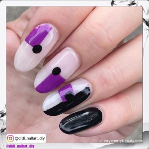 Black And Purple Nail Designs In Almond Shape