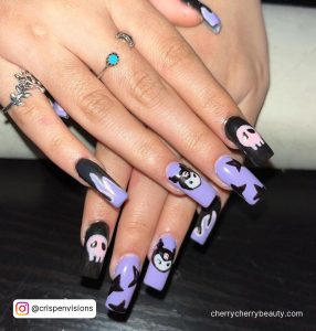 Black And Purple Nails Halloween With Skulls