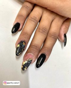 Black And Rose Gold Marble Nails In Almond Shape