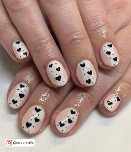 Black And White Heart Nails In Almond Shape