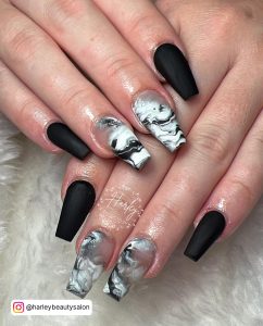 Black And White Marble Coffin Nails With Matte Finish On Two Fingers