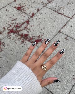 Black And White Swirl Acrylic Nails In Almond Shape
