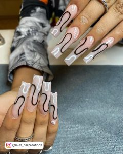 Black And White Swirl Nail Design In Coffin Shape