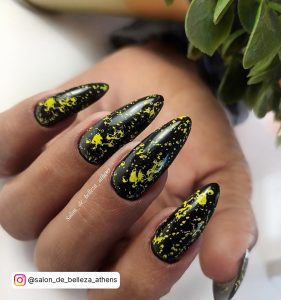 Black And Yellow Marble Nails In Almond Shape