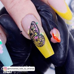 Black And Yellow Nail Art With Butterfly