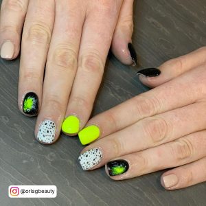 Black And Yellow Nails Design With Dots