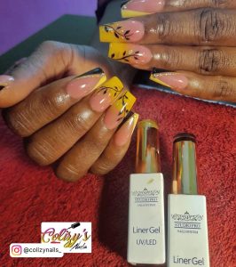 Black And Yellow Nails In French Tip Design