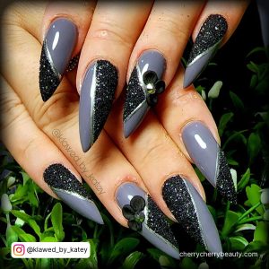 Black Glitter Stiletto Nails With Purple Combination