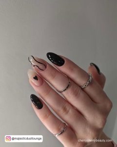 Black Nails Almond Shape With Swirls And Hearts
