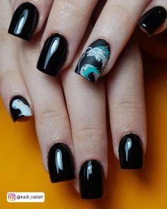 Black Nails Short Square With White And Green Design On Two Fingers