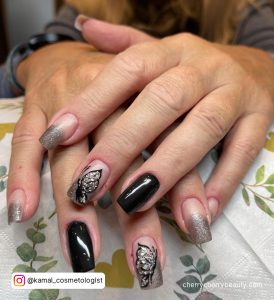 Black Nails Silver Glitter With Butterfly On Middle Finger