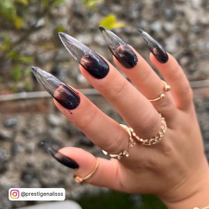 Black Nails With Flames In Stiletto Shape