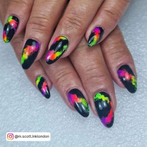 Black Nails With Neon Green, Orange And Pink Design