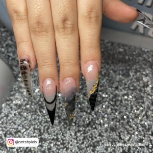 Black Ombre Stiletto Nails With Golden Line