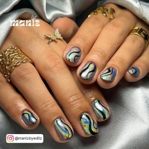 Black Swirl Nail Design With Rainbow Shade