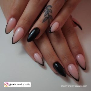 Black Tipped Stiletto Nails With Nude Base Coat