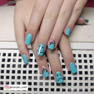 Blue And Black Nails Coffin With Flames