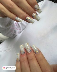 Blue And Gold Marble Nails