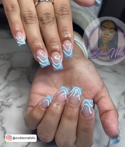Blue And White Nails Ombre With Swirls On Tips