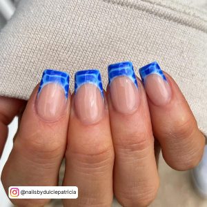 Blue French Tip Almond Nails
