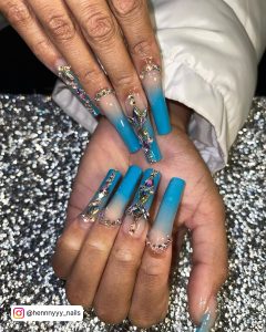 Blue Ombre Nails With Diamonds In Coffin Shape