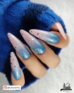 Blue Ombre Nails With Glitter In Almond Shape