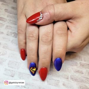 Blue Red And Yellow Nails In Stiletto Shape