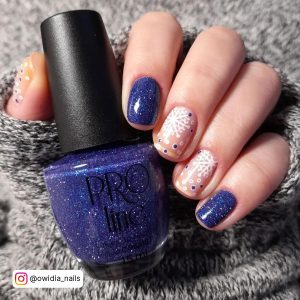 Blue With Glitter Nails